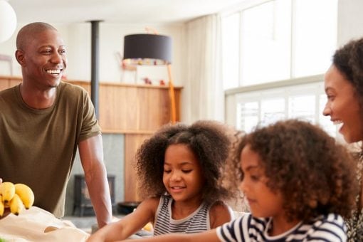 Happy family has meal together