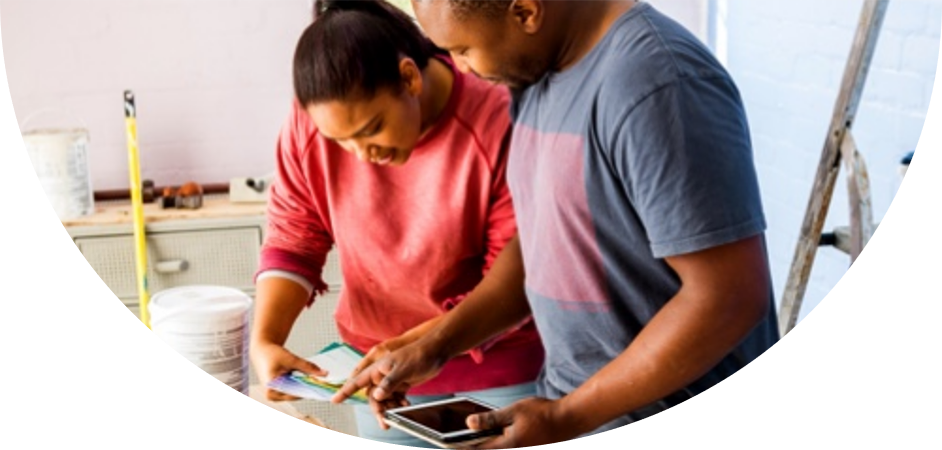 Image of a couple picking colors for their new room