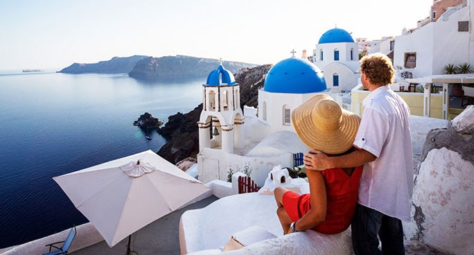 Image of a couple enjoying a beatiful ocean view