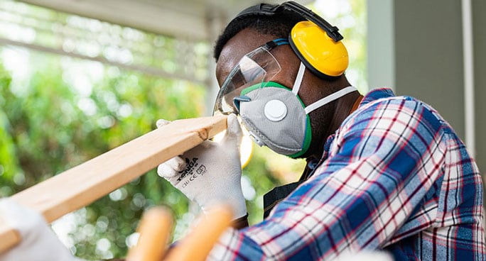 Image of man doing carpentry work