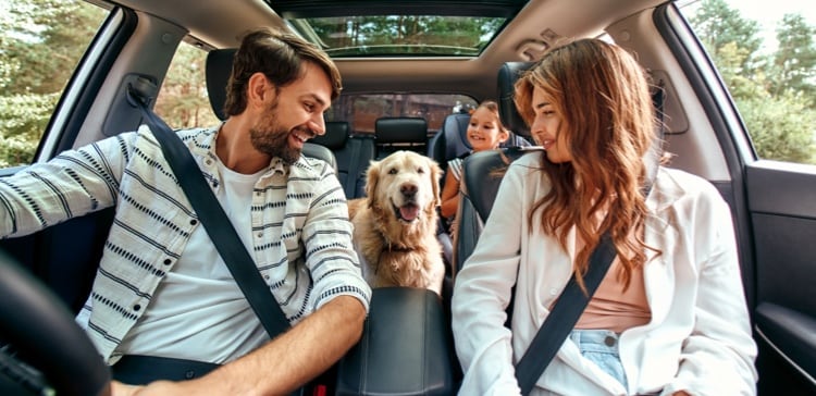 Image of family in a car going on vacation